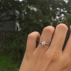 Carat diamond on finger hotsell